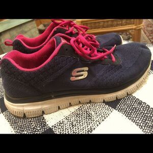 Nice comfortable shoes by Skechers in size 9